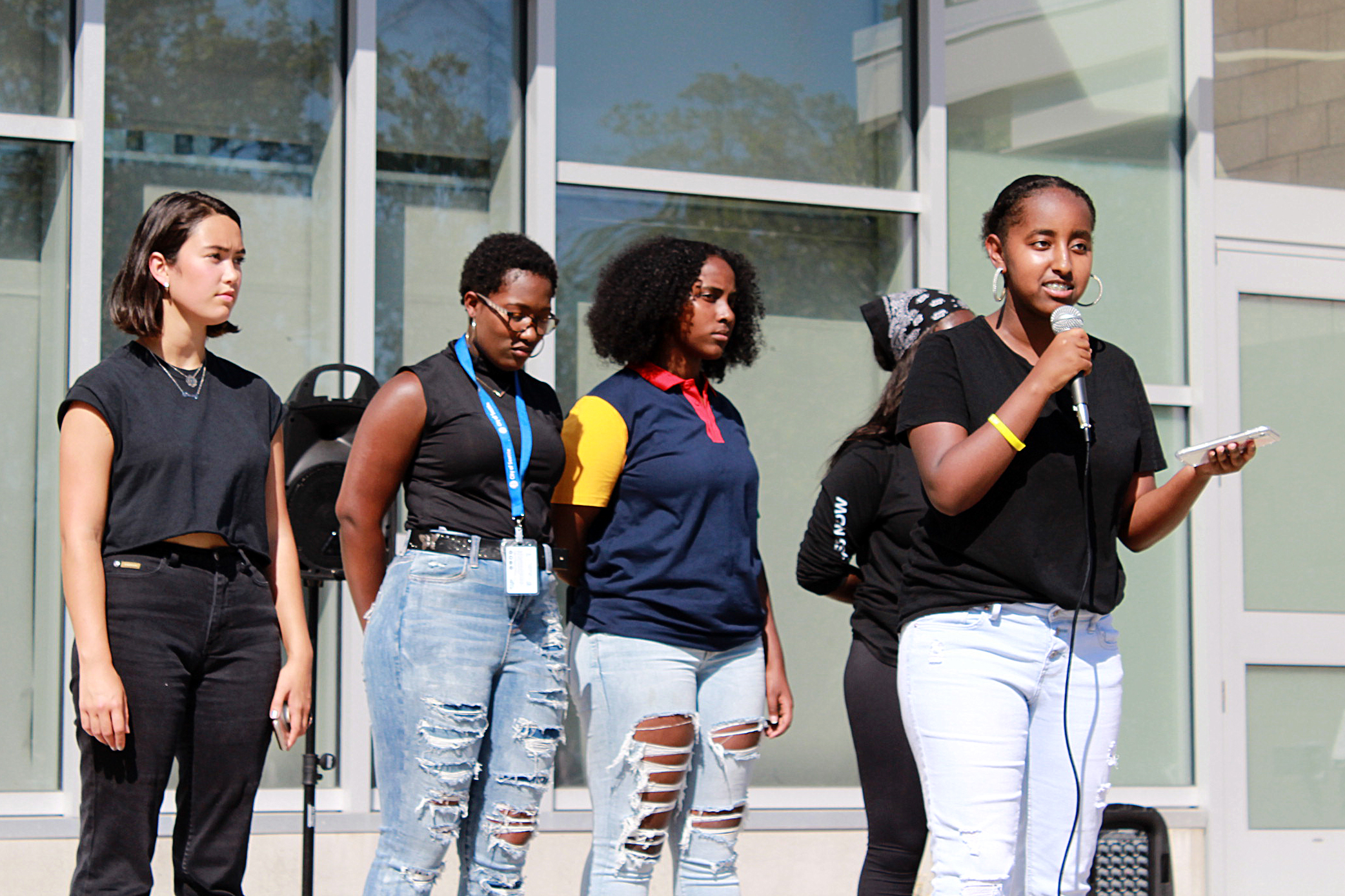 Students from Seattle Public Schools and student allies from other districts speak at a rally at the Rainier Beach Community Center on September 4. Pictured from left to right: Davie Ross, Angelina Riley, Kidist Habte and Betty Mekonnen.