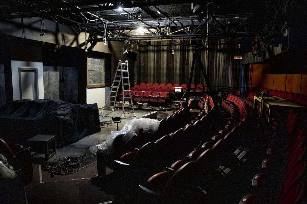 Empty theater, with props and stage elements covered