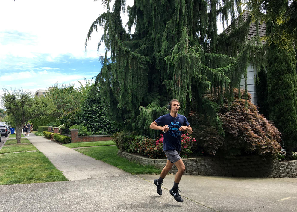 man jogging in Queen Anne neighborhood