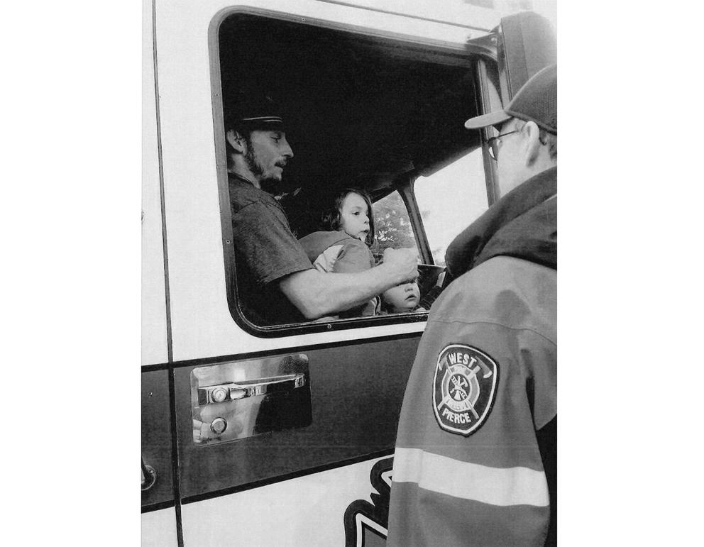 A man in a fire truck