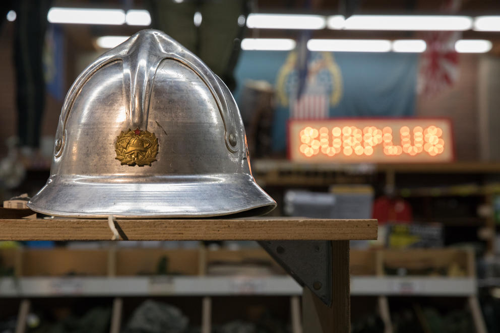 A vintage Serbian fireman helmet at the Federal Army & Navy Surplus store