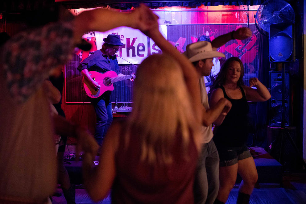 Local duo The Jerkels plays music for dancers during a recent Tuesday at Little Red Hen. 