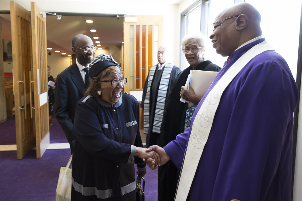 Rev. James Stallings shakes hands with a member of Mount Zion Baptist Church on Sunday, May 27, 2018. 