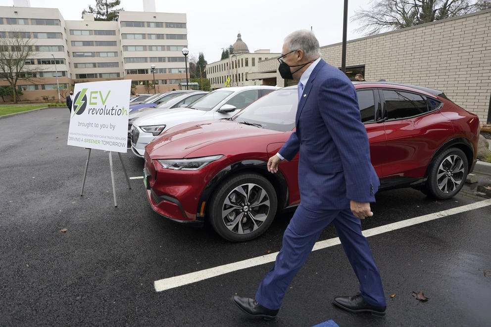 Inslee and an electric car