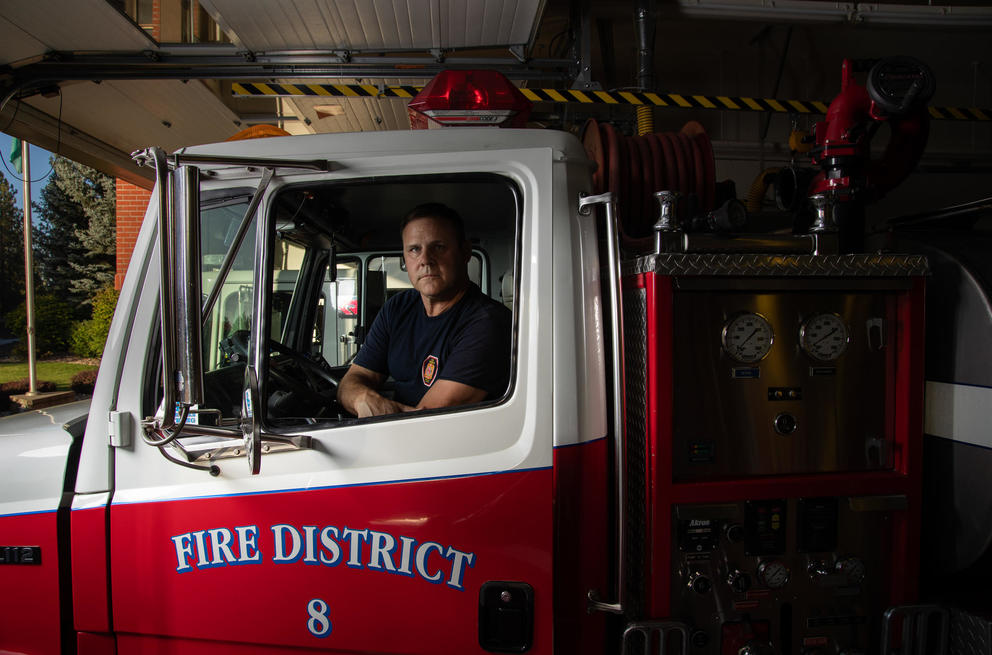 Tom Hatley sits in a fire truck at the Valleyford Fire Station