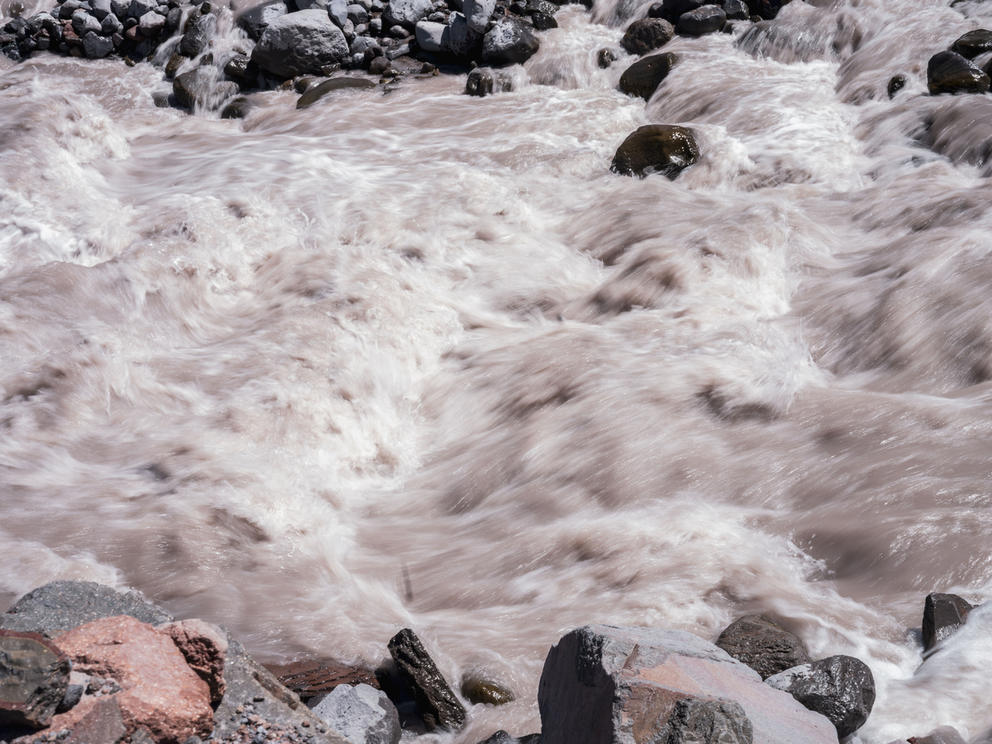 Water rushing over rocks in a river