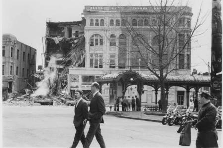 Street scene with partially collapsed building