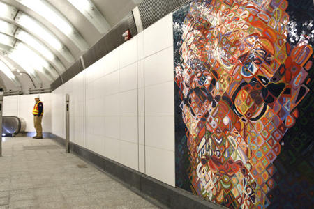 In this Dec. 22, 2016 file photo, a self-portrait mosaic by artist Chuck Close adorns the walls of the 86th Street subway station on the Second Avenue line in New York. Credit: Seth Wenig/AP File