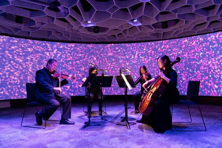 Seattle Symphony Orchestra musicians demonstrate the high-tech Octave 9 space