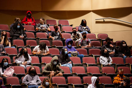 Students sit mostly socially-distanced in the auditorium seats on day two of a two-day Jumpstart orientation program for incoming 9th graders at Mount Tahoma High School in Tacoma, Wash., in this Aug. 26, 2021 file photo. About 120 students participated in the program, which is meant to help ease the transition to high school. (Lindsey Wasson for Crosscut)