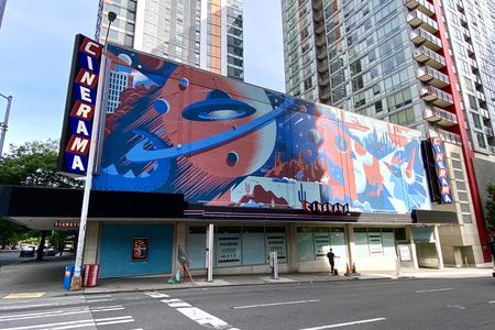 An image of the abandoned Cinerama from a street crosswalk