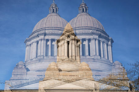 A photo illustration of a double image of the Washington State Capitol dome.