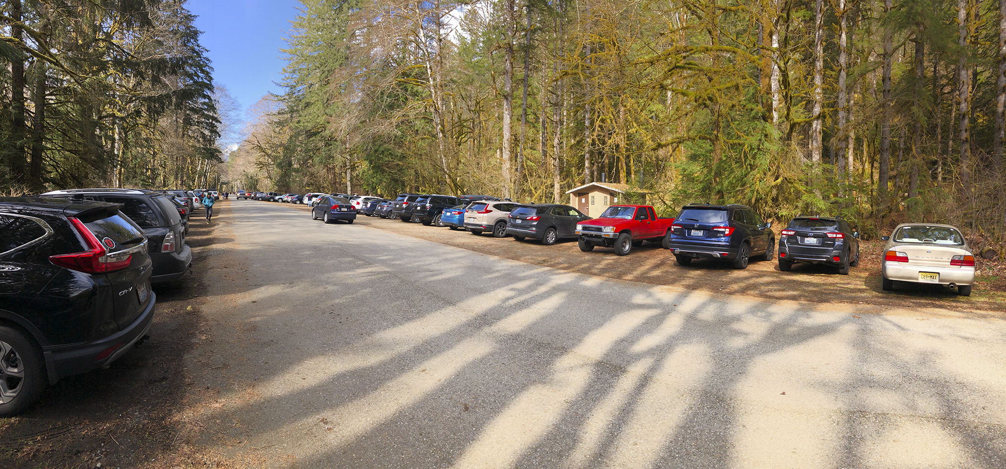 Full parking loot at a trailhead