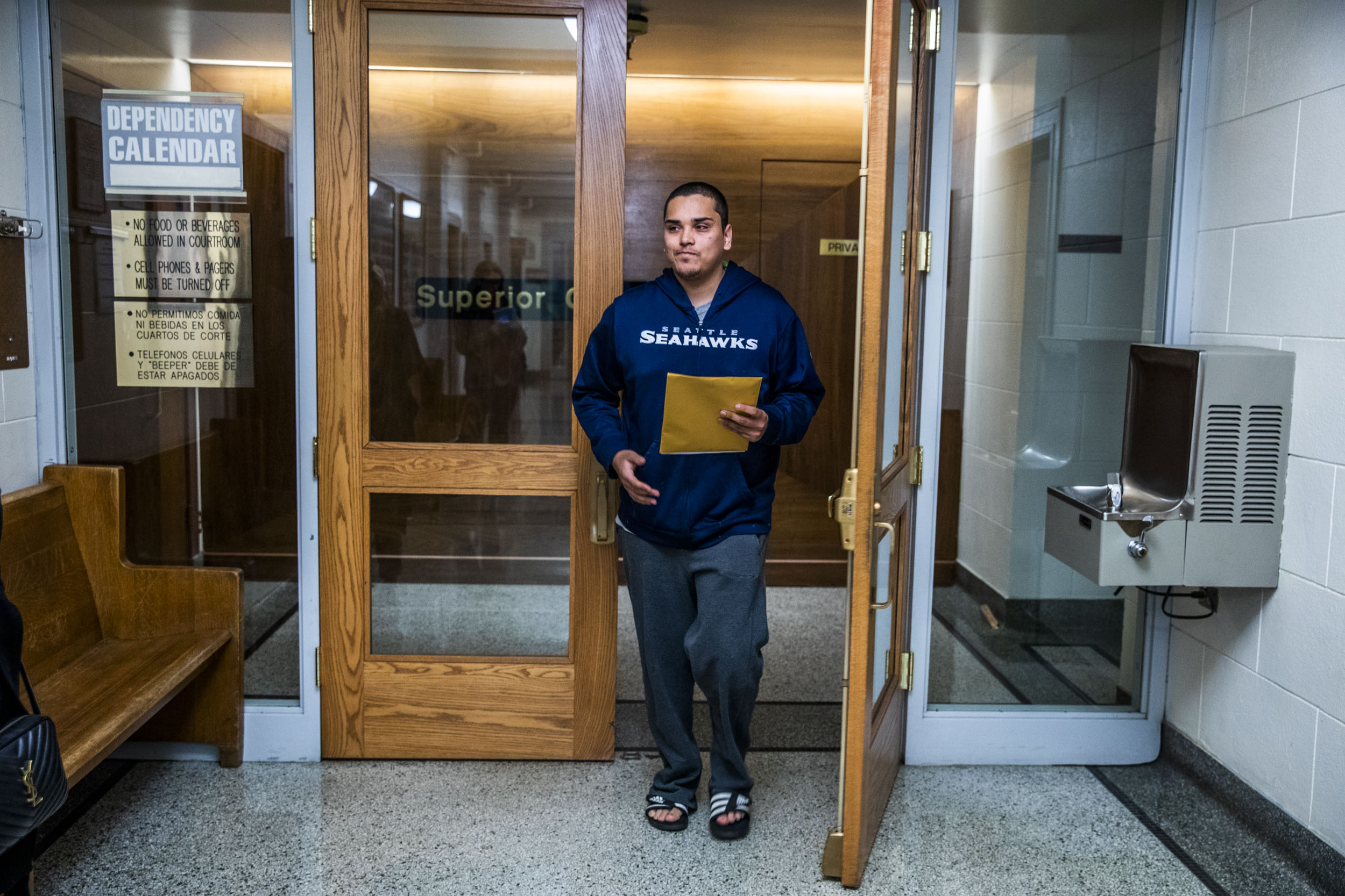 Jesus Lopez, 21, leaves an administrative procedure hearing at the Mount Vernon courthouse where he was released from the Washington foster care system.