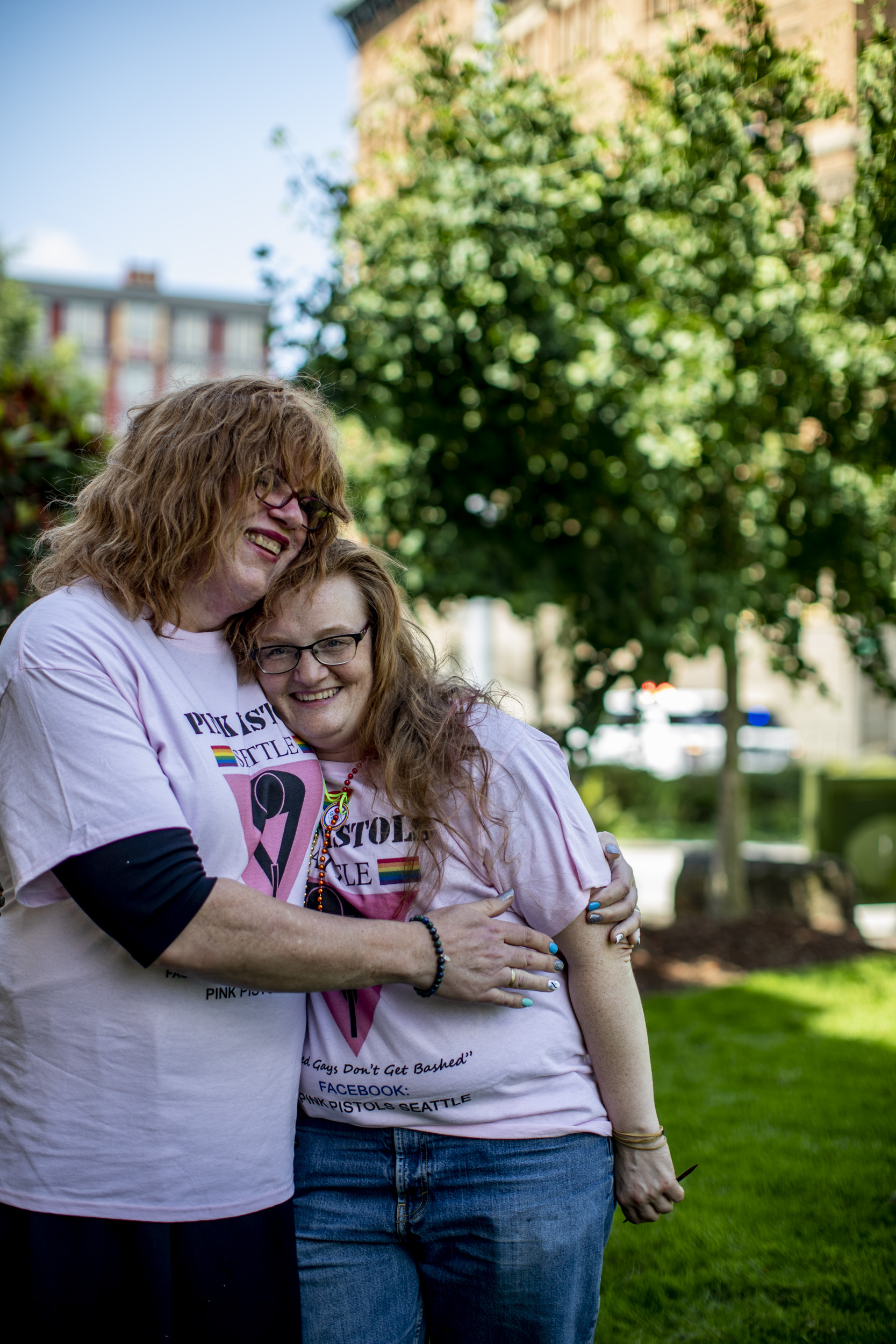 Pink Pistols administrator Margaret Rhoades, left, and her partner Susan YoungCrane at Tacoma Pride on July 13, 2019. The couple started coming to meetups two years ago. They like the inclusiveness and the focus on gun education. “It’s a safe place,” Rhoades says. “There’s not a lot of judgment that goes on.”