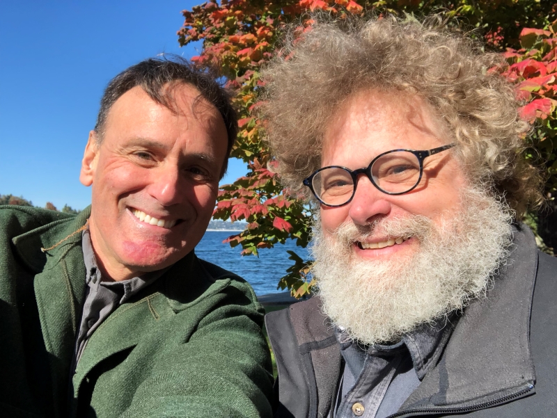 David Guterson (left) and Knute Berger take a selfie in the park