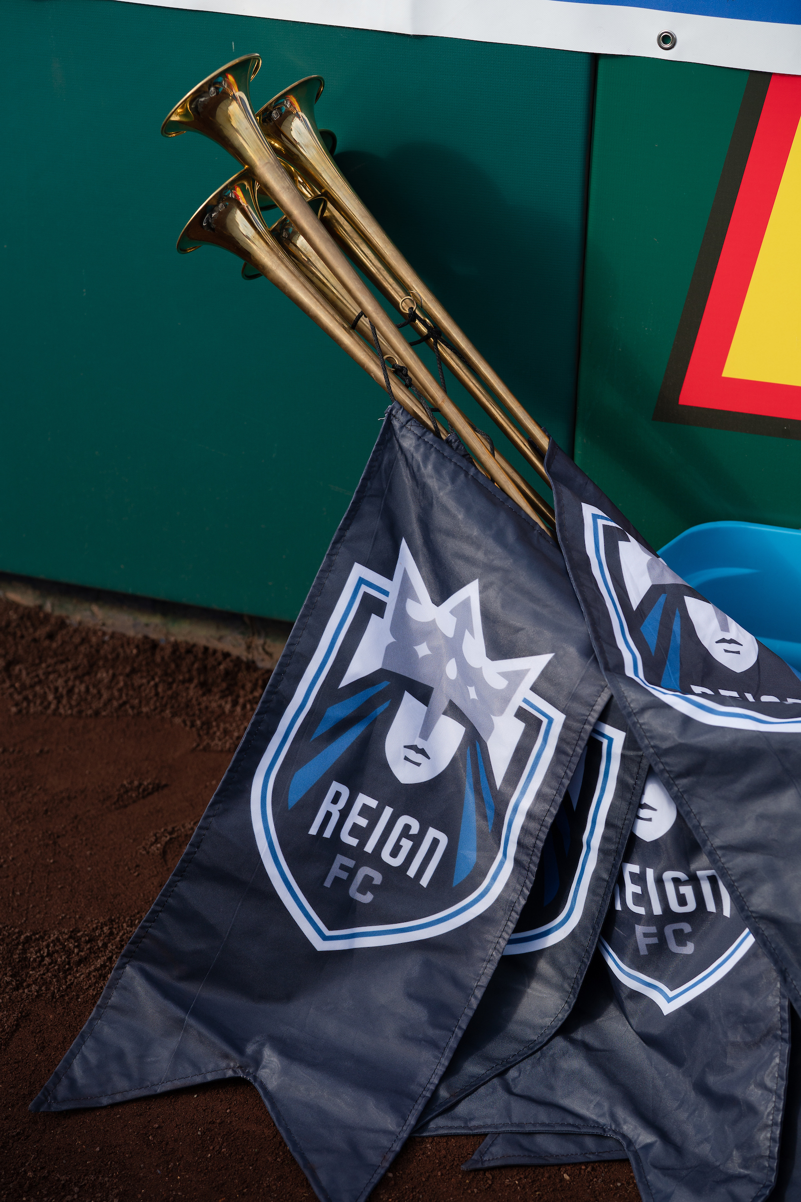 Reign FC banners lay on the ground