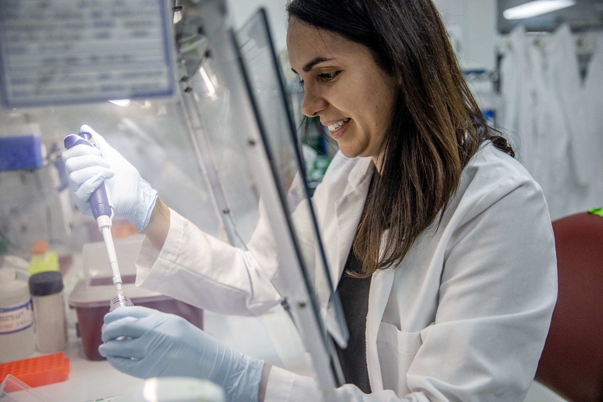 Intellectual Ventures researcher Corrie Ortega works on control sampling as a part of her cervical cancer research on June 17, 2019. (Photo by Dorothy Edwards/Crosscut)