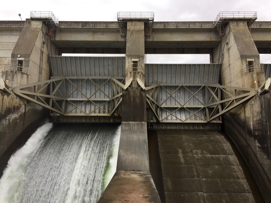 Water flows through an open spill bay at The Dalles Dam.  Cassandra Profita/OPB/EarthFix