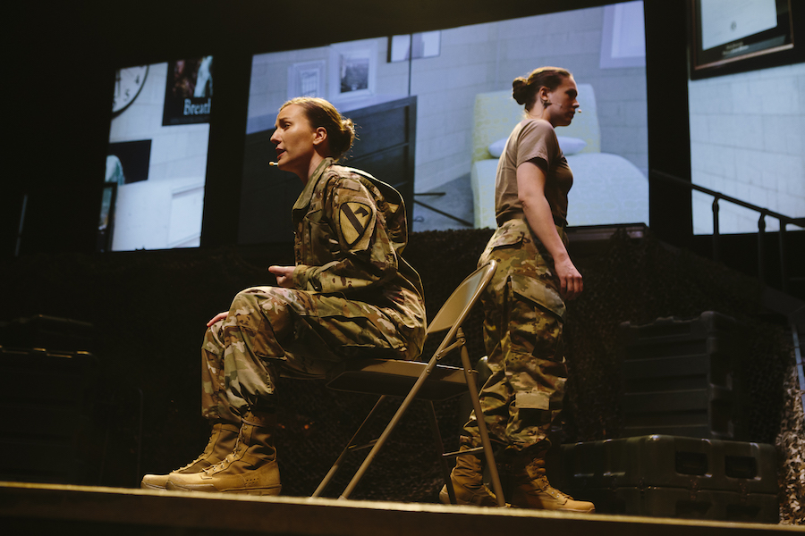 two women in fatigues, singing