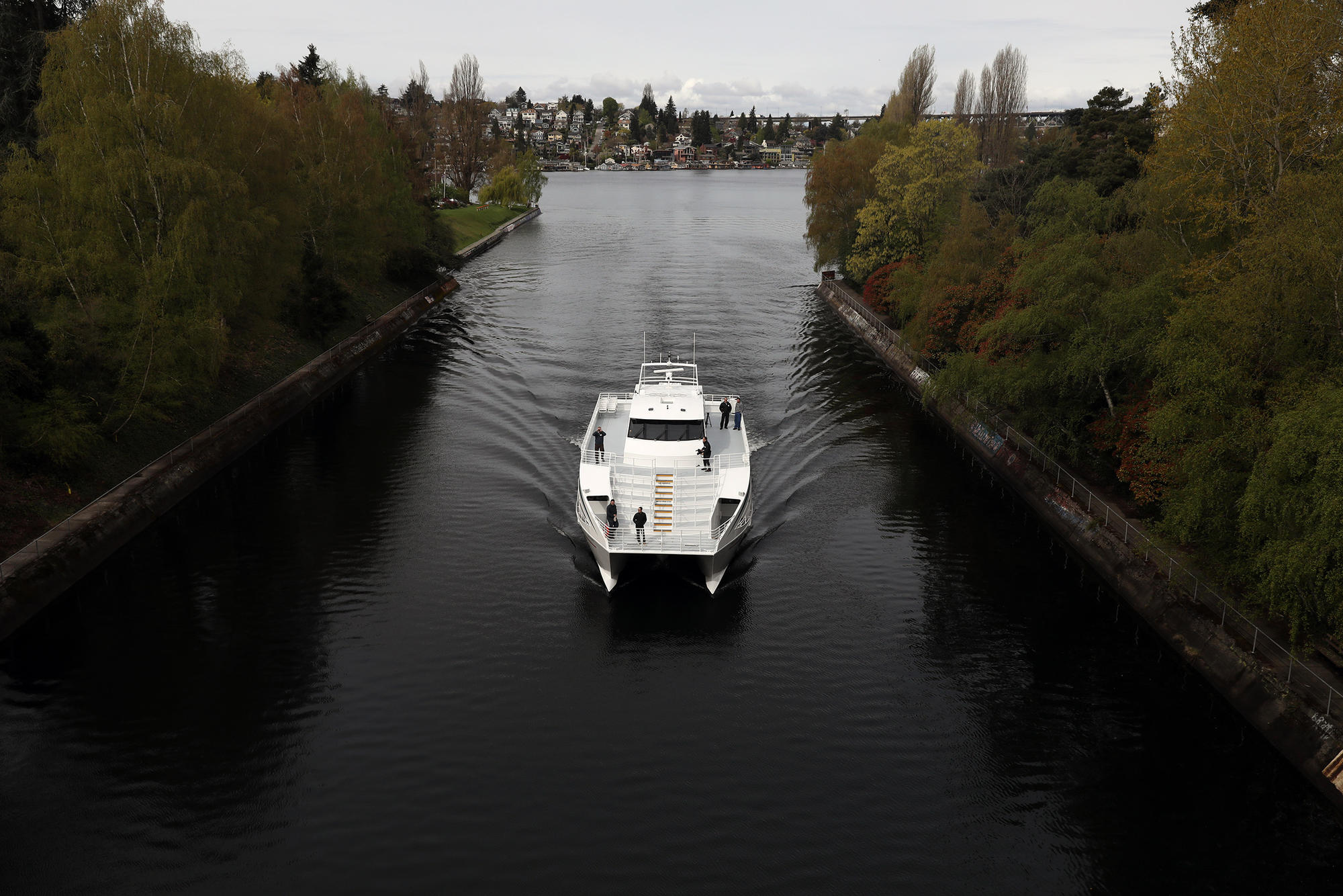 The Saratoga is seen passing through the Montlake Cut from the Montlake Bridge during a water taxi test ride from Lake Union Park at South Lake Union in Seattle to Southport on Lake Washington in Renton, during the morning of April 18. 