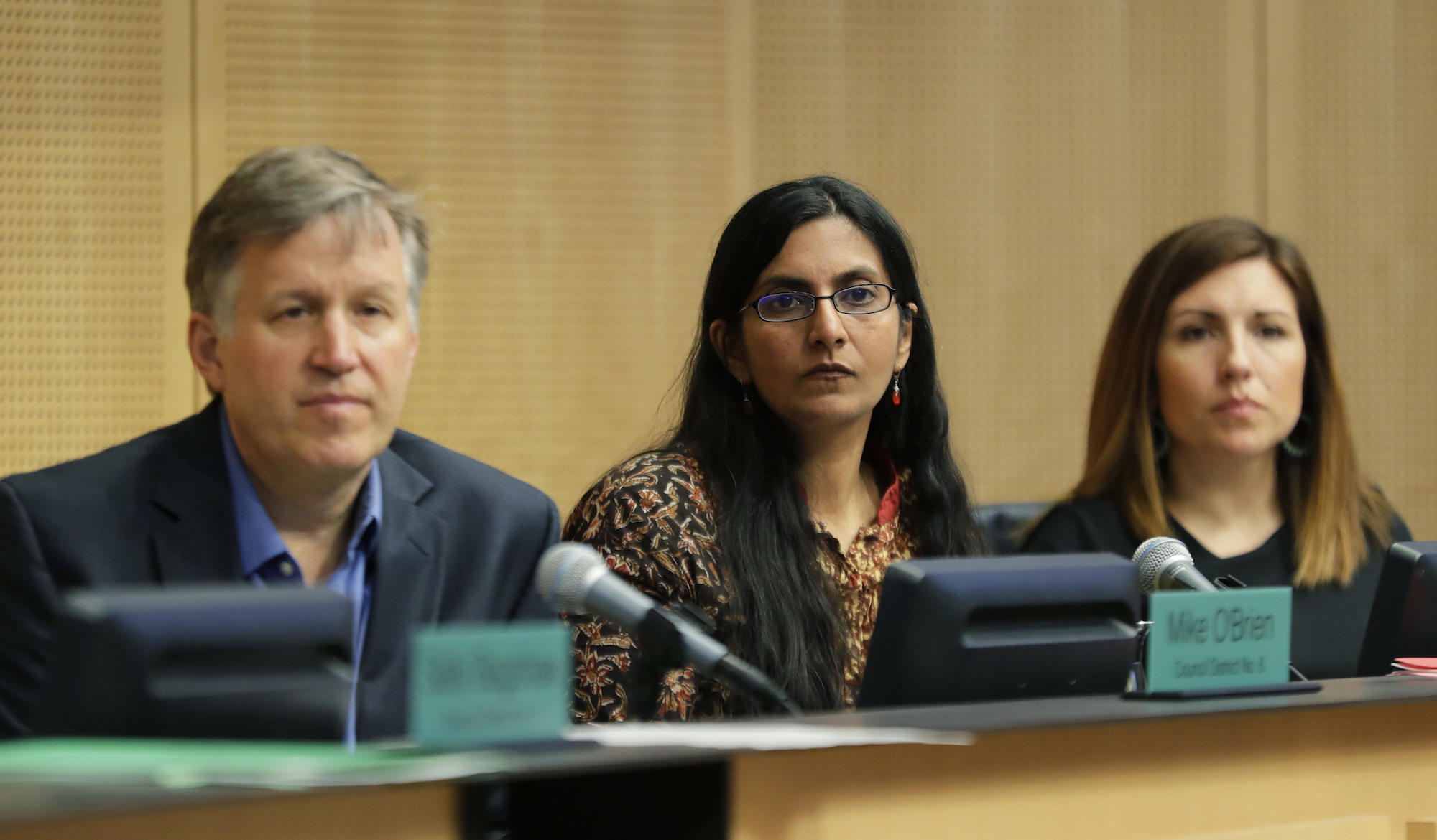 City councilmembers Mike O'Brien, Kshama Sawant and Teresa Mosqueda listen to comments on a proposed tax during a committee meeting at City Hall on May 9.