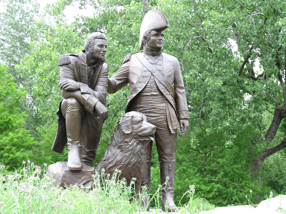 Statue of two explorers and a dog