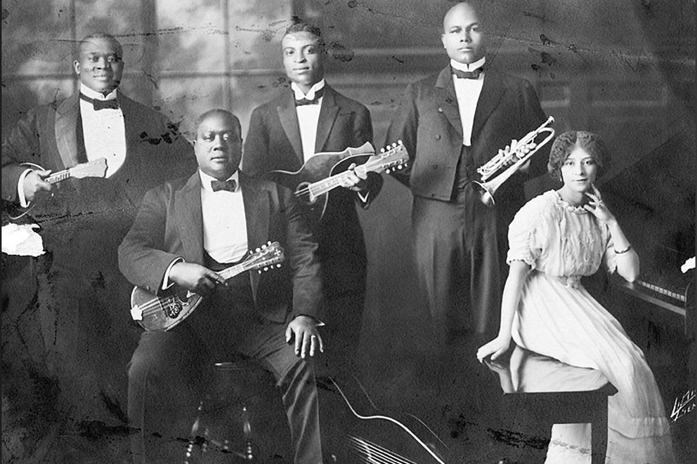 Five musicians with their instruments