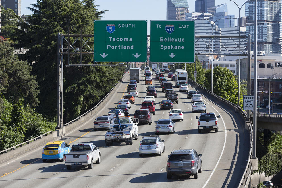 Cars travel on the interstate toward Seattle
