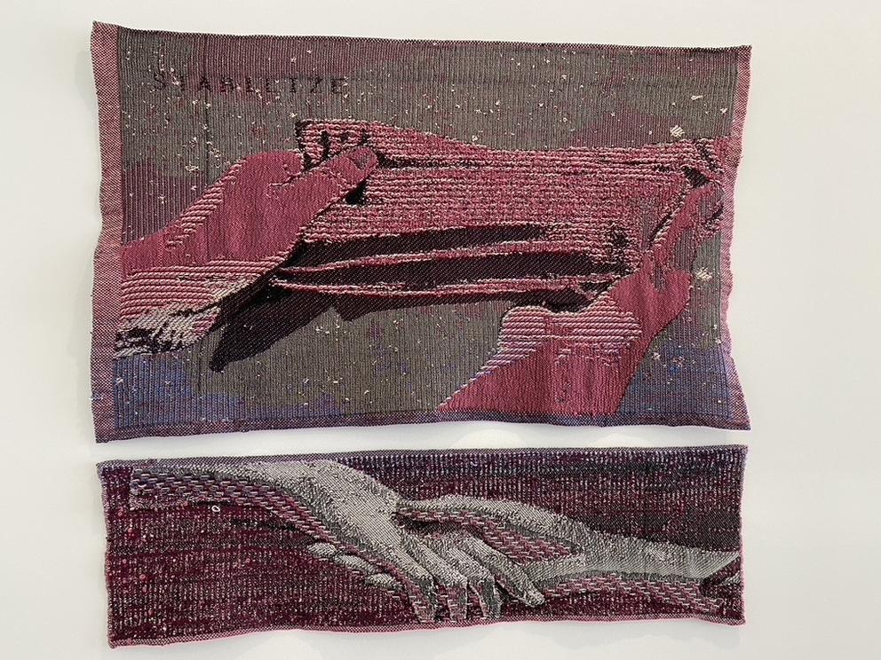 Two woven digital jaquard tapestries featuring hands in warm earth tones