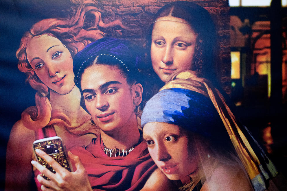 A collage poster of famous women of art history, including Frida Kahlo and Mona Lisa, taking a selfie