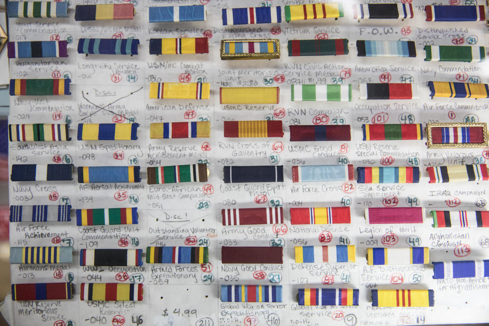 U.S. Army & Navy pins behind the counter at the Federal Army & Navy Surplus store in Seattle's Belltown neighborhood. 