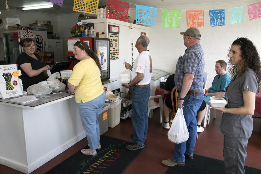 Customers in line at Los Hernández Tamales 
