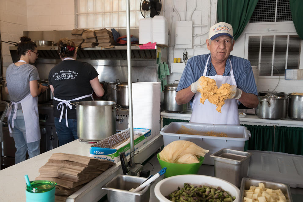 Owner Felipe Hernández prepares some of his signature tamales in the kitchen of his family restaurant in Union Gap, Washington.