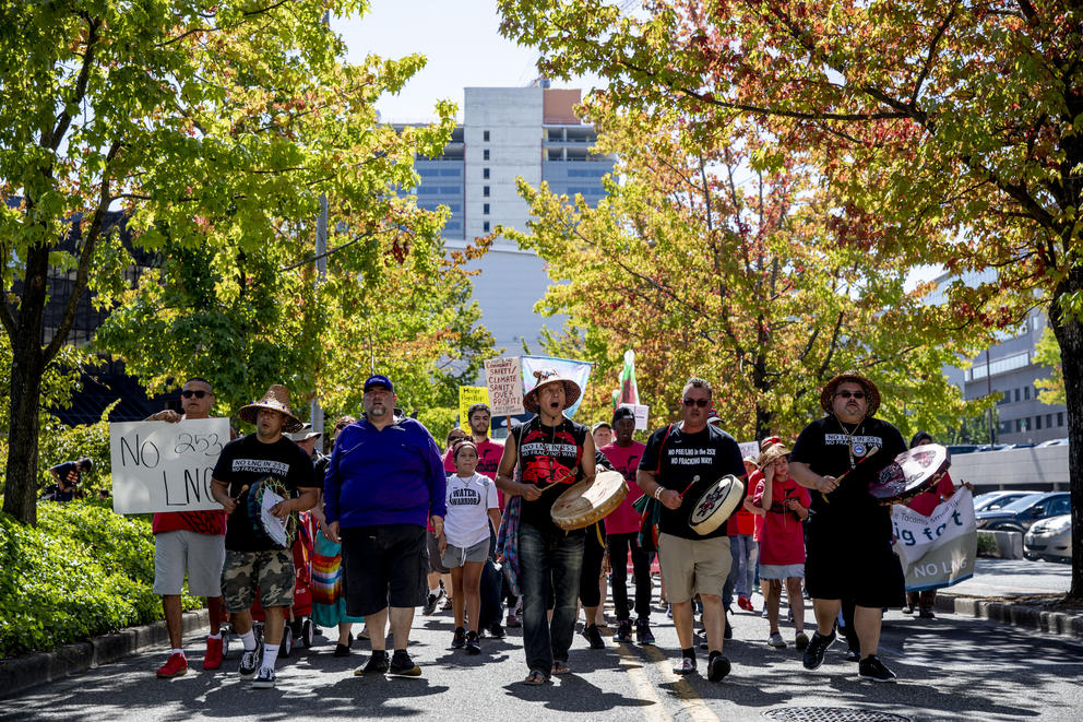 Puyallup tribal members and supporters march in protest against the Puget Sound Energy LNG project in downtown Tacoma on Aug. 27, 2019. (Photo by Dorothy Edwards/Crosscut)