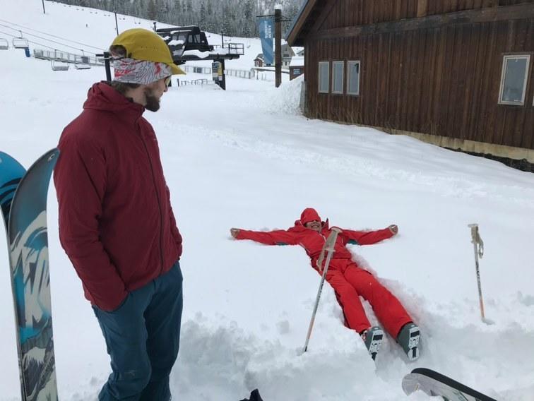 skier falls in snow