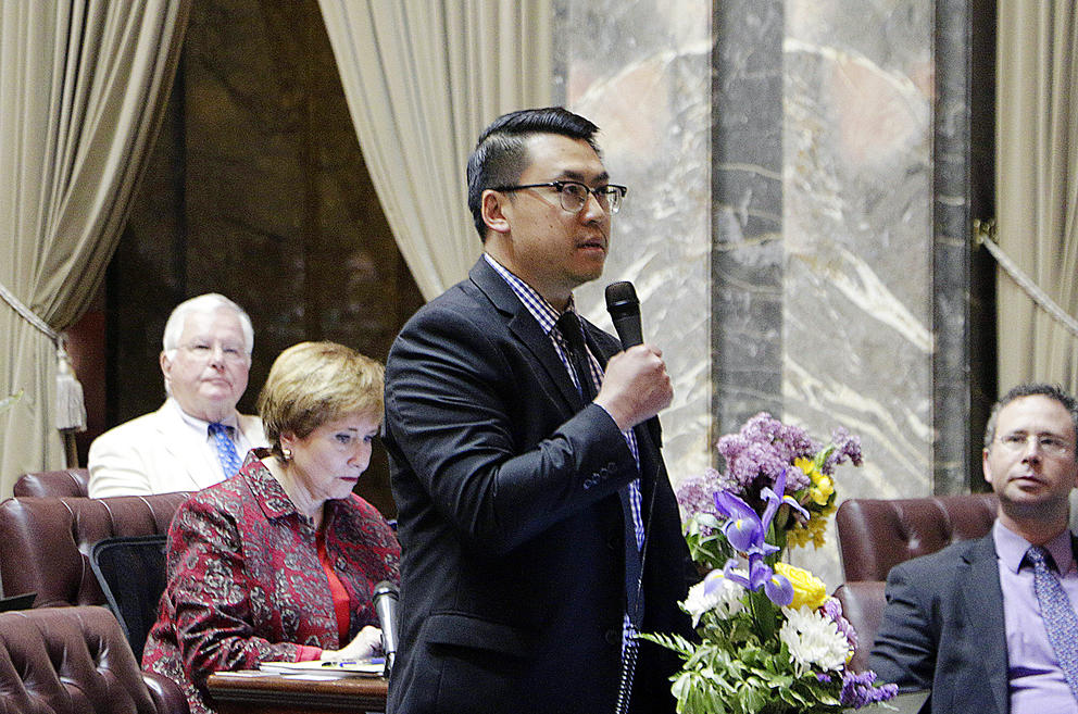 Joe Nguyen speaks on the floor of the Washington State Senate