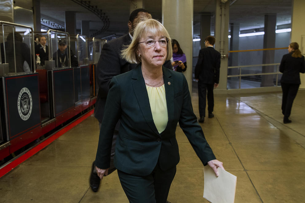 U.S. Senator Patty Murray, a democrat representing Washington, walks with a paper in her hand from the senate subway into the capitol. 