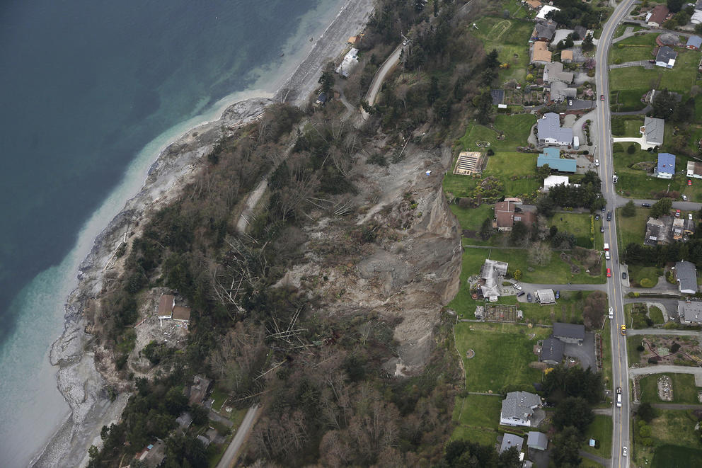 In this aerial photo, a landslide is shown near Coupeville, Wash. on Whidbey Island, Wednesday, March 27, 2013.