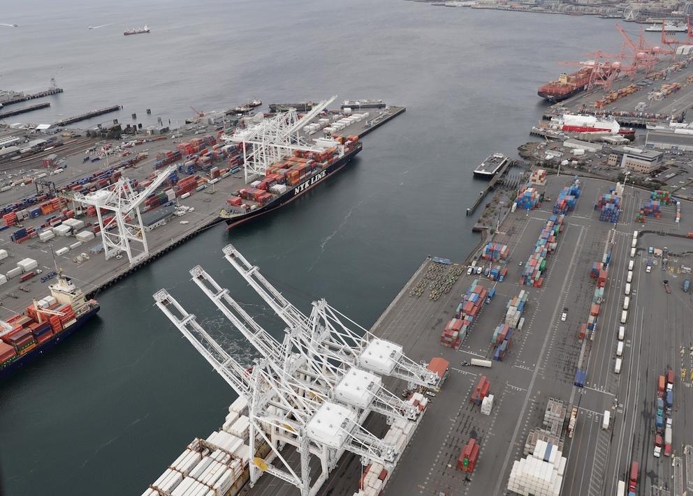 Cargo cranes at the Port of Seattle are shown in this aerial photo, Friday, Feb. 23, 2018, in Seattle. (AP Photo/Ted S. Warren)