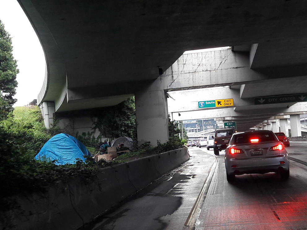 Homeless tents pitched by I-5 in Seattle 