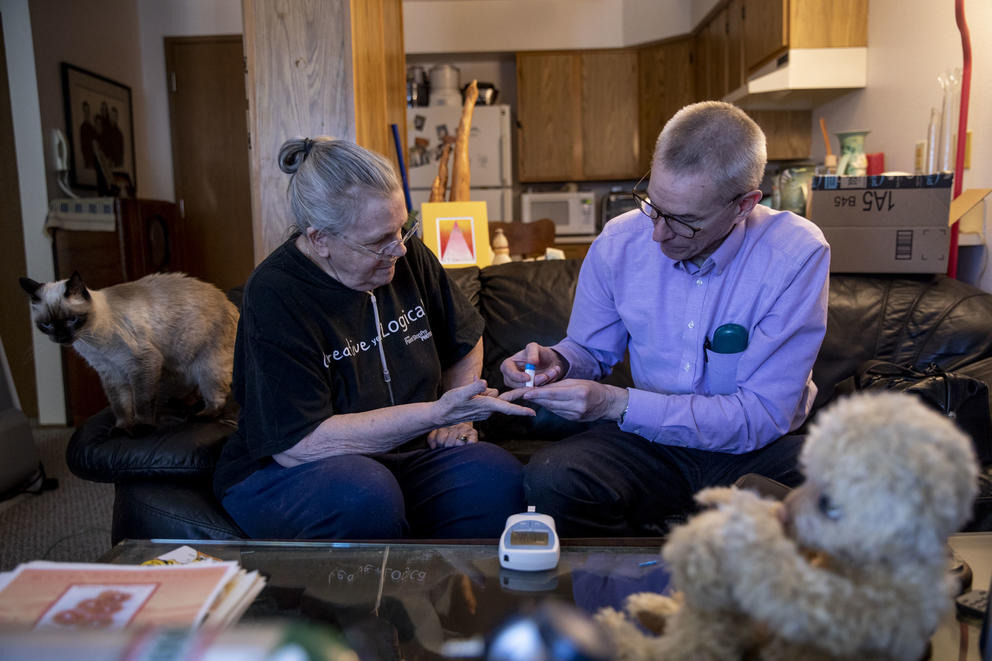Dr. Peter Lehmann visits with patient Dina Krieg, 74, in her Poulsbo home on March 19, 2019.