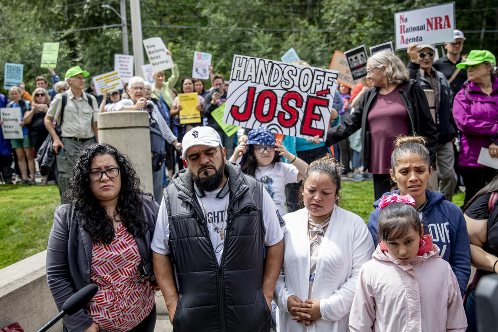 Jose Robles, stands with his family and lawyer as he prepares to walk in to the ICE offices in Tukwila, Wash. on July 17, 2019.