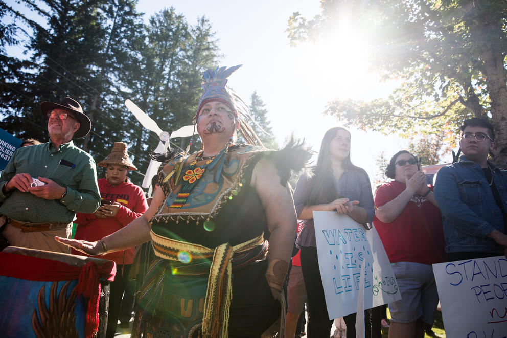 Northwest tribes in full traditional dress march in protest.
