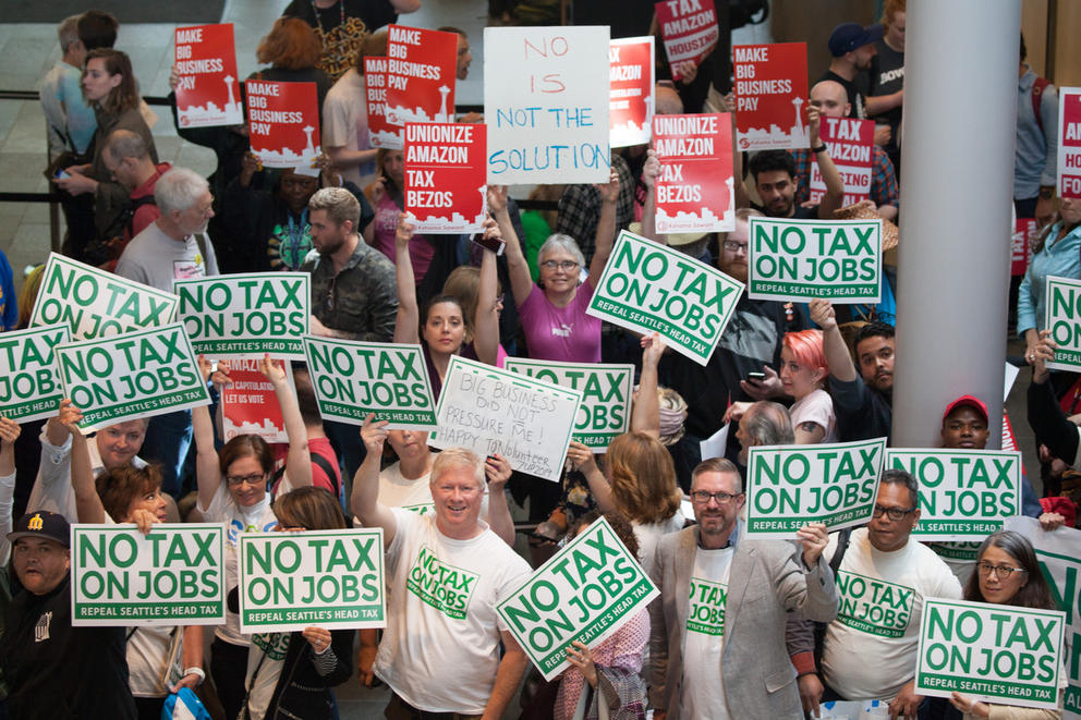 Pro- and anti-head tax activists at Seattle City Hall