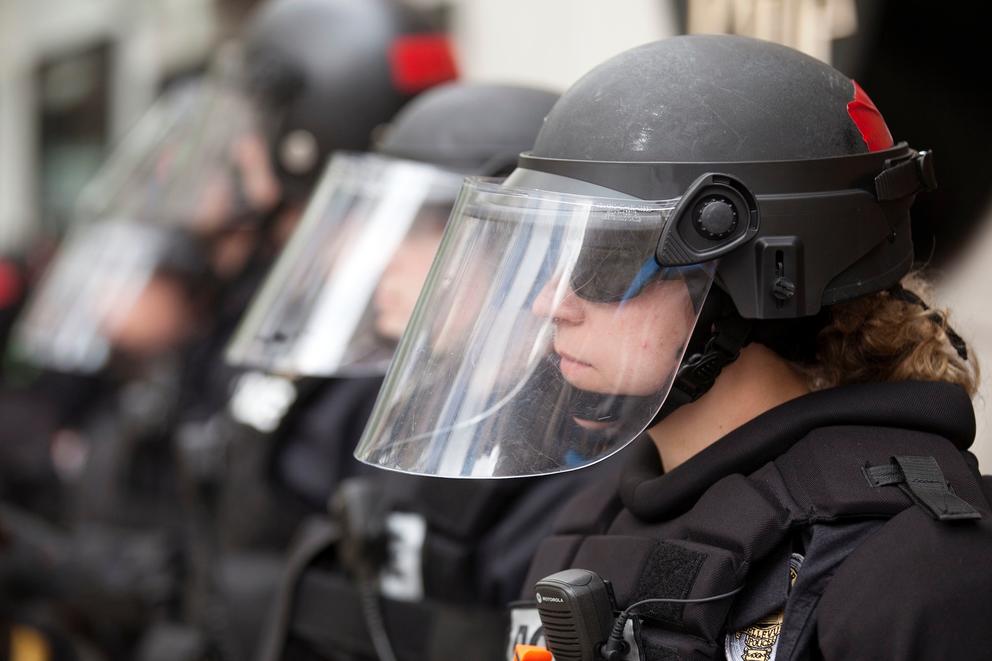 Helmeted police officers