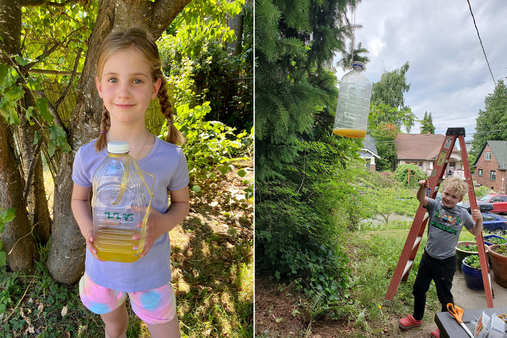 two kids hold hornet traps in their yards