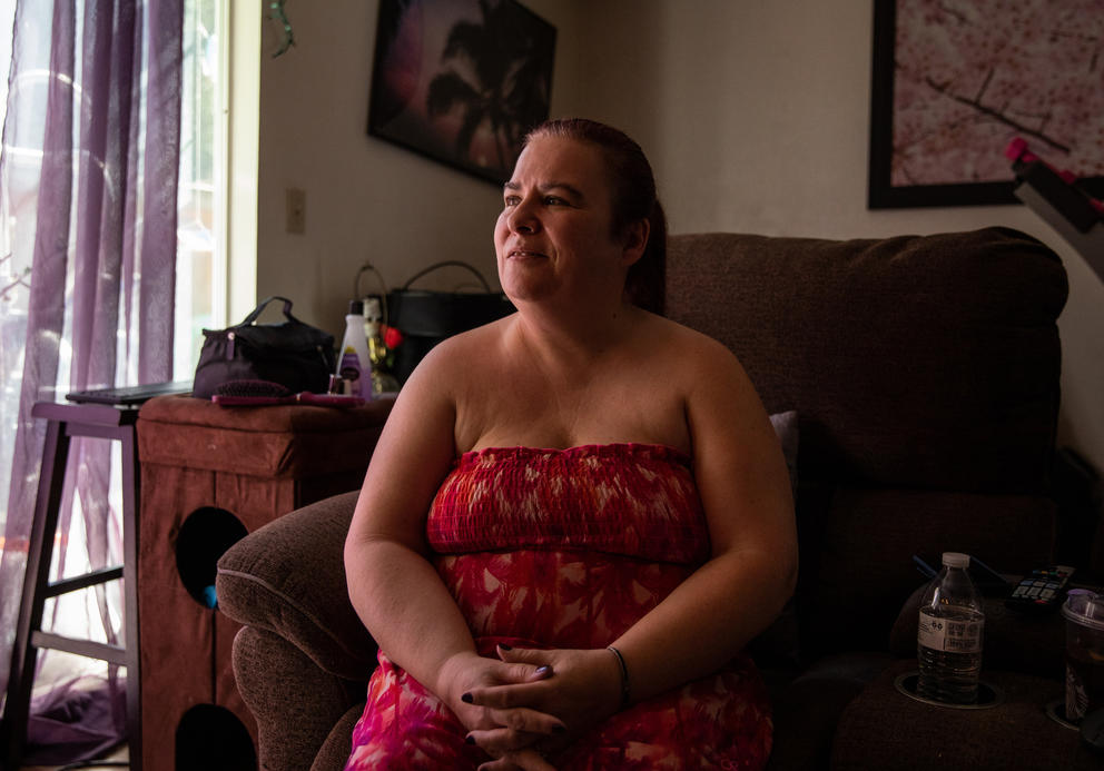 a women sits in her apartment in kent