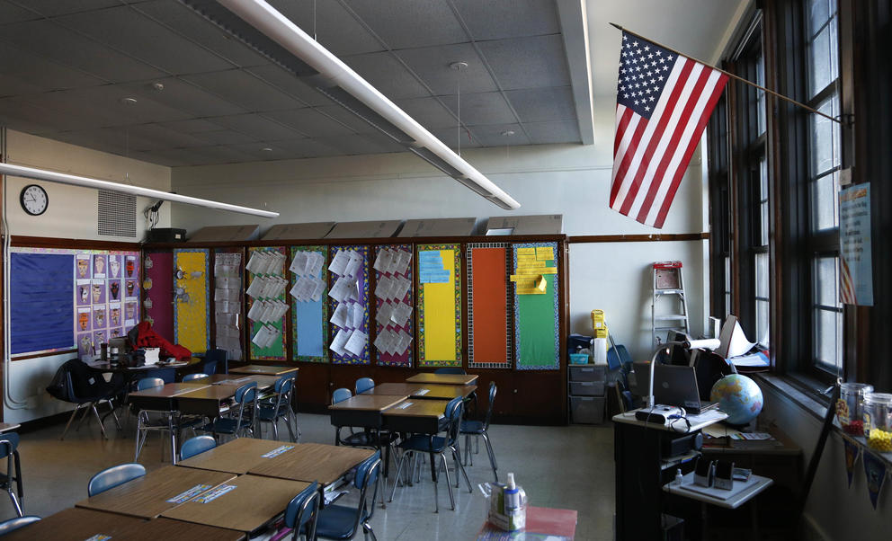 American flag hanging in a classroom