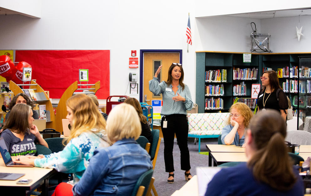 Elissa Dornan, Director of Behavioral Health and Multi-Tiered System of Supports, answers questions during a Bethel School District Behavioral Health Team presentation and training with the district's counselors and social workers